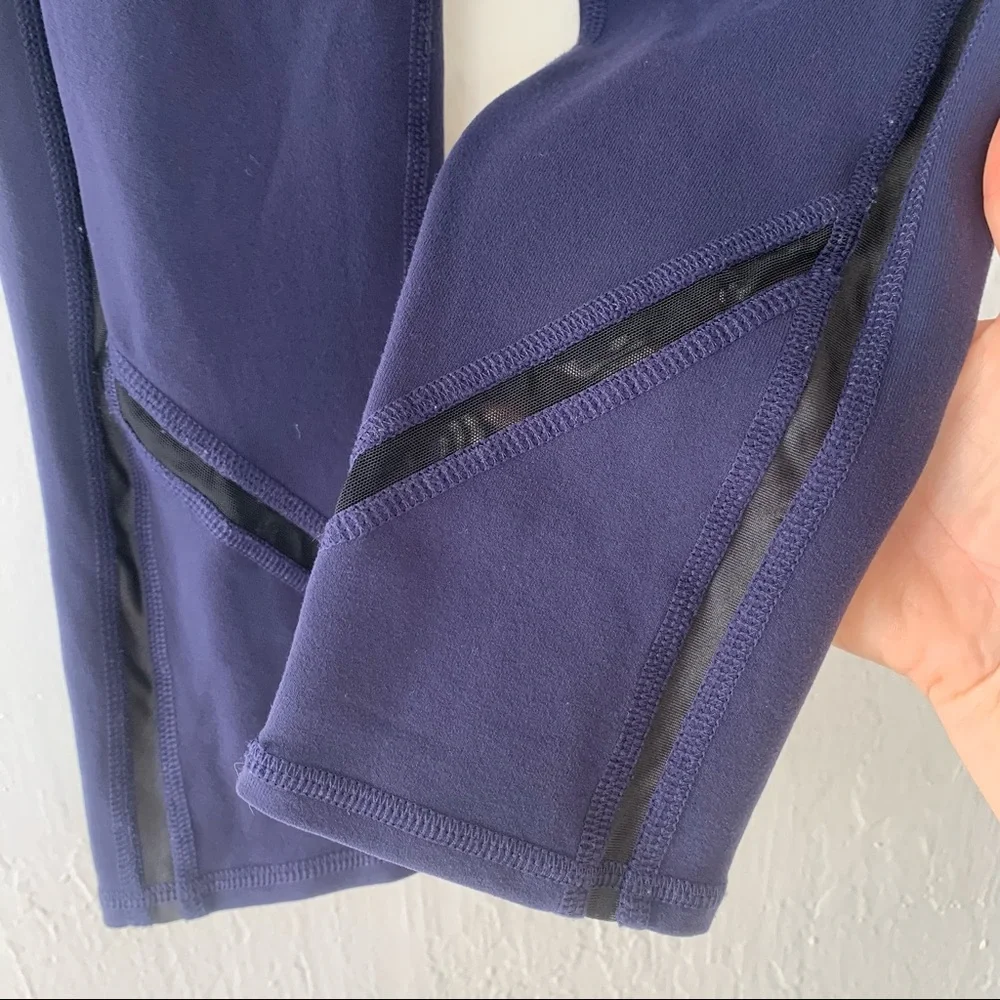 ALO Yoga Continuity Capri Legging In Rich Navy